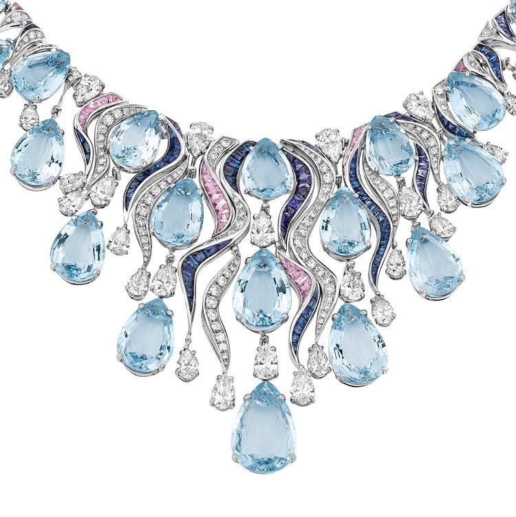 Close-up detail of the Bulgari aquamarine and sapphire necklace, highlighting the intricate gem settings and varied cuts.
