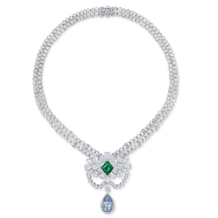 Close-up view of the Graff Le Collier Bleu de Rêve pendant, showcasing the magnificent 10.47 carat blue diamond and 4.22 carat emerald.