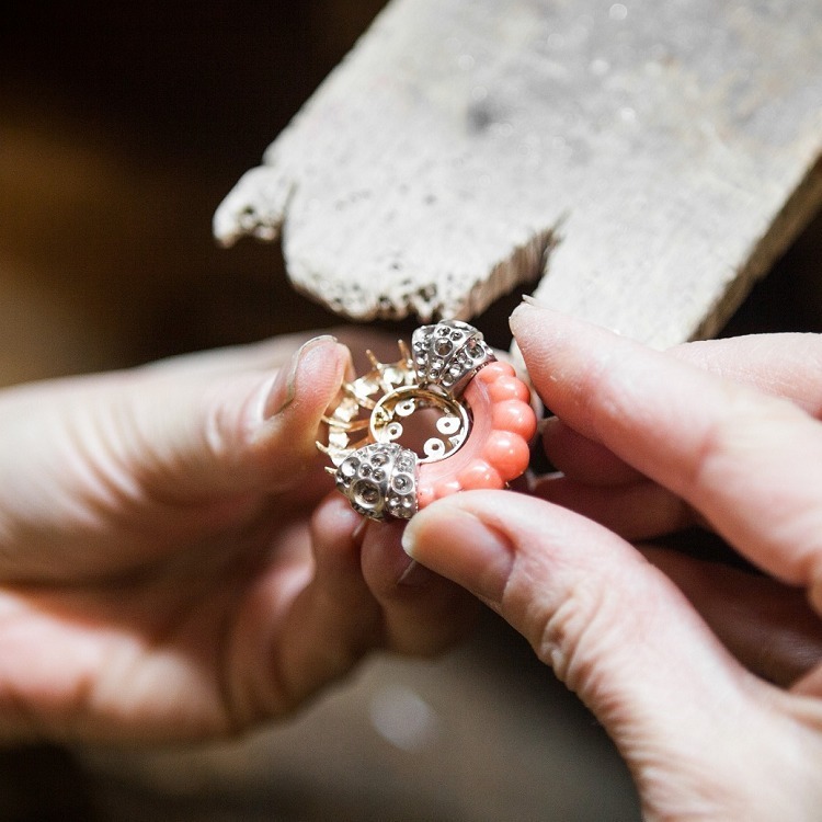 Angle view of the luxurious Van Cleef & Arpels 'Summer Cocktail' ring, emphasizing stone setting and craftsmanship