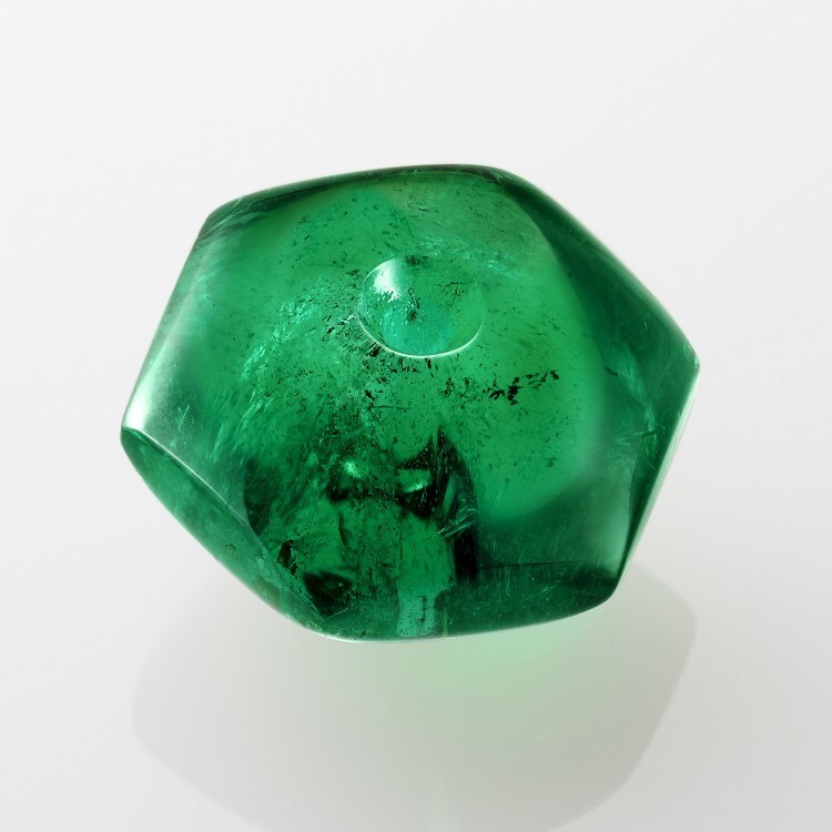 Close-up of the stunning 28.06-carat cabochon-cut emerald on the 'Amour Amour' ring by Van Cleef & Arpels