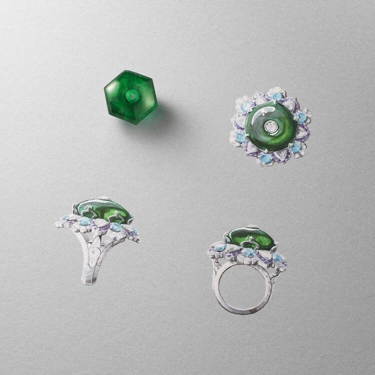Top-down view of the Van Cleef & Arpels 'Amour Amour' ring's emerald, diamond, and colorful gemstone halo