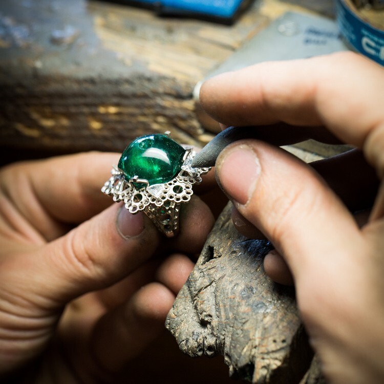 Elegant display of the Van Cleef & Arpels 'Amour Amour' ring, part of the Peau d'Âne collection