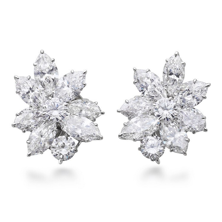 Exquisite Chopard High Jewelery diamond earrings featuring marquise and brilliant round cut diamonds