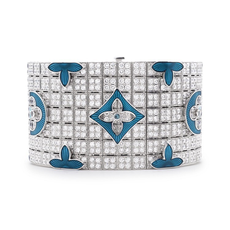 Stunning Louis Vuitton 'Voyage dans le temps' bracelet, showcasing both Monogram and Damier patterns in white gold with blue spinels.