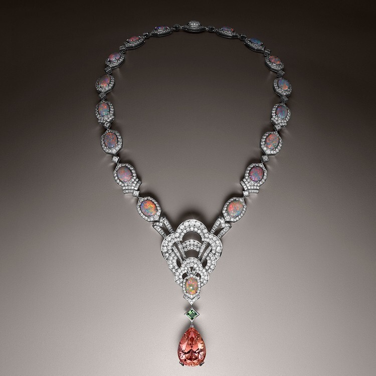 Breathtaking Louis Vuitton Conquêtes white gold pendant necklace featuring a prominent pear-shaped imperial topaz.
