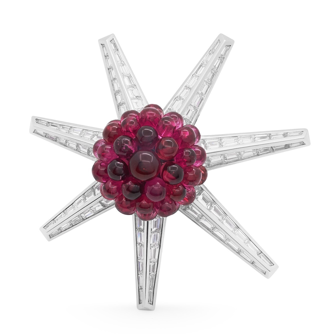 Close-up of the Tiffany & Co. Blue Book Starburst Brooch featuring rubellite and diamonds.